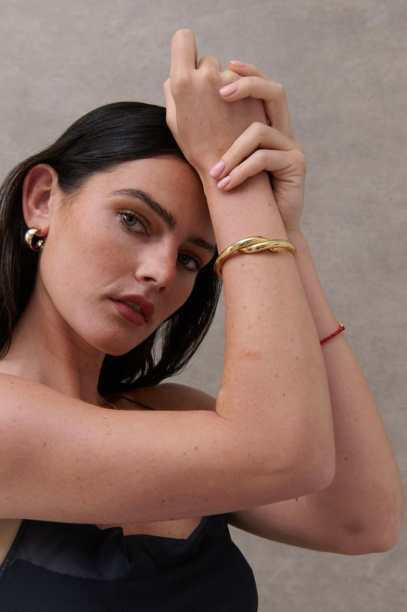 Interlock Twist 18K Gold Plated Bangle